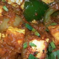 Chilly Paneer · Cubes of cheese sauteed with onion, bell pepper and broccoli in chilly garlic sauce.