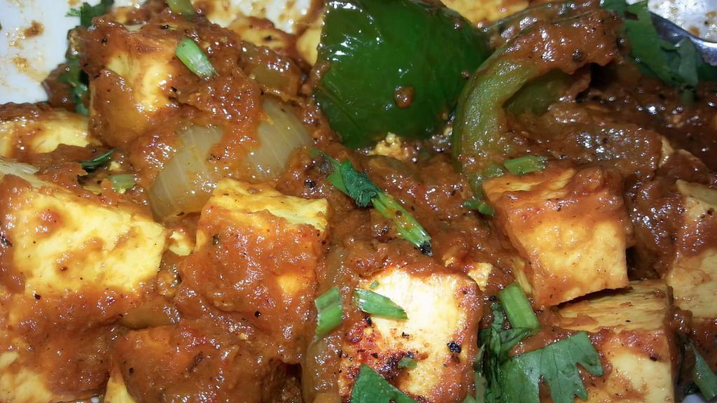 Chilly Paneer · Cubes of cheese sauteed with onion, bell pepper and broccoli in chilly garlic sauce.