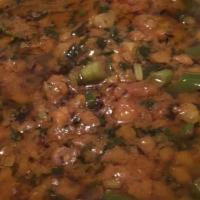 Dal Tarka Yellow · Yellow lentils sauteed with ginger, garlic, onion, tomato and Indian spices.