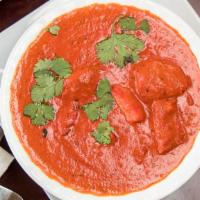 Chicken Tikka Masala · Most popular. Chicken sauteed with bell pepper and onion in a spiced tomato sauce.