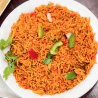 Chicken Biryani With Egg · Basmati rice cooked with boneless chicken in a blend of herbs & egg