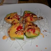 Dinosaur Egg · Deep fried avocado, wrapped with spicy kani, spicy tuna inside in chef's sauce.