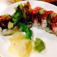 Spider Maki Roll · Fred soft shell crab, avocado, cucumber, tobiko, lettuce and scallion with eel sauce.

There...