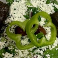 Greek Salad · Romaine lettuce, tomatoes, cucumber, red onions, Italian pepper, kalamata olives, crumbled f...