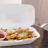 Greek Fries · Oregano and crumbled feta.