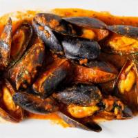 Mussels Marinara · Fresh mussels steamed in marinara sauce.