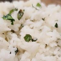Cilantro Lime Rice · Delicious fluffy white rice seasoned with lime and fresh cilantro! Included as an optional i...