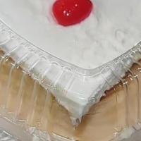 Tres Leches · Traditional Latin dessert. This cake is soaked in 3 milks and topped with a heavenly whipped...