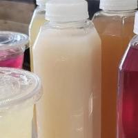 Agua Frescas · Homemade fresh tropical juices ready to quench your thirst! Available in Hibiscus (Jamaica),...