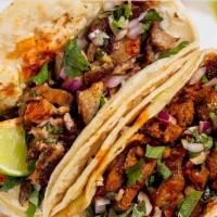Tacos With Onion Cilantro Lime (3) · Topped off with onion cilantro and lime.