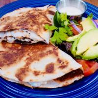 Quesadilla · Flour tortillas with melted Oaxaca cheese and a side salad.