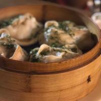 Hand Made Manti With Meat (4 Pc.) · Steamed dumplings stuffed with hand cut steak, onion and central asian spices. Served with s...