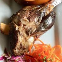 Braised Lamb Shank And Vegetables   · Lamb Shank are slowly simmered in Central Asian style. Served with  Sautée mix Vegetables an...