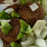 Kids Falafel Over Rice · 3 falafel balls with sauteed onions and green peppers on top of rice, salad lettuce, tomato,...