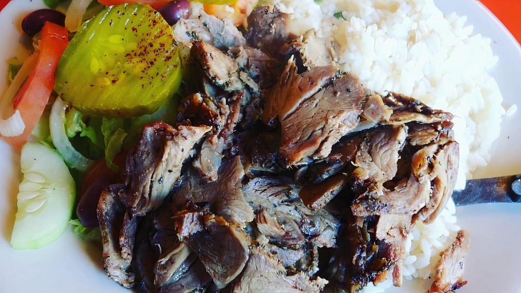 Leg Of Lamb Special · Boneless, roasted Halal leg of lamb served with rice, salad and homemade lemon mint mayonnaise. Served with lemon juice and olive oil mixed into salad.