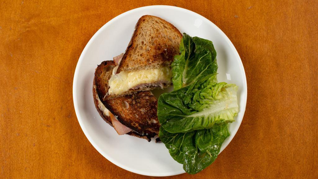 Croque Monsieur · With ham, gruyère, bechamel and toasted country bread.
