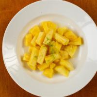 Fresh Pineapple · With ginger syrup and lime.