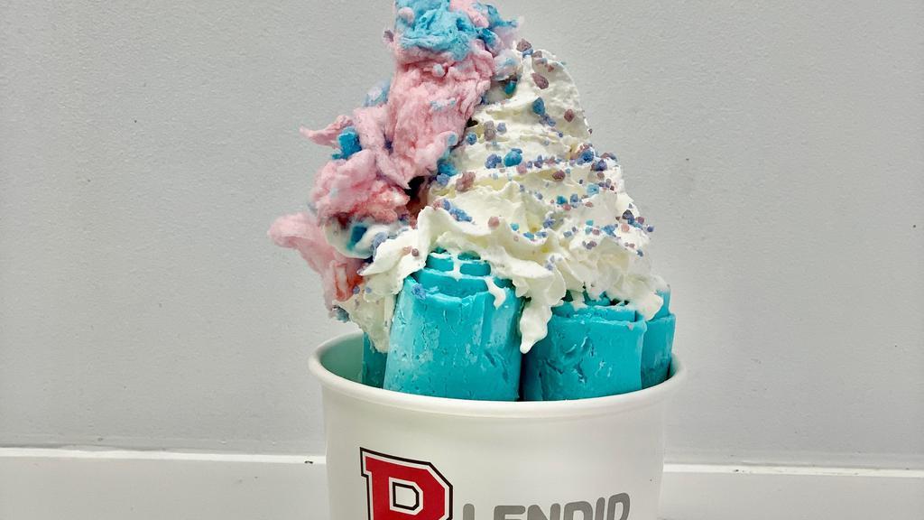 Carnival Remix · Blue Cotton Candy flavored Ice Cream topped with whipped cream, white chocolate drizzle, Cotton Candy crunch, and Cotton Candy.