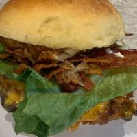 Fried Chicken Club · Crispy fried chicken thigh, Cheddar , bacon, cheese, lettuce, tomato & garlic aolii