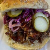 Pulled Pork Bbq On Roll · Pulled pork, slaw, pickled onions, pickles, and BBQ sauce. No cheese recommended.
