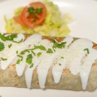 Quesillo Burrito · Served with rice, beans, guacamole, cilantro, onions, lettuce, tomato, sour cream and powder...