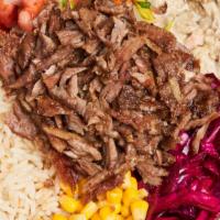 Lamb Gyro Babaganoush Bowl · lamb gyro
white rice
babaganoush
corn
cabbage salad
tomato salad
olives (black