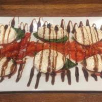 Mozzarella Caprese · Fresh Mozzarella, Roasted peppers, Fresh Basil, tomatoes, with Italian Seasonings, Olive Oil...