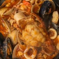 Frutti Di Mare · Lobster Tail. Shrimp, Sea Scallops, Clams, Mussels, & Calamari in a Light Marinara Sauce