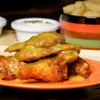 The Honey Mustard Wings · A sweet and tangy honey mustard sauce smothered over oven-baked crispy chicken wings.