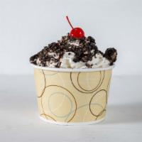 Midnight Caramel River · Creamy golden vanilla and dark chocolate ice cream flooded with a thick and rich caramel swi...