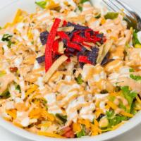Chopped Southwest · grilled chicken, romaine, corn, pico de gallo, Colby jack, tortilla straws, ranch dressing, ...