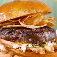 Crunch Burger · Cheddar, sautéed onions, fries, minced garlic, blue cheese and Buffalo sauce, topped with ke...