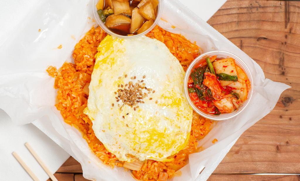 Kimchi Fried Rice · Mild or spicy. Rice, kimchi, spam, and egg.