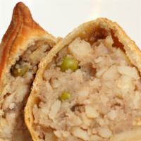 Veggie Samosa · Vegan friendly stuffed fried pastry filled with potatoes, peas, carrots, and Indian spices. ...