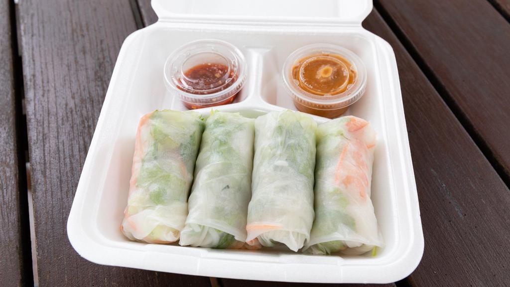Summer Rolls · Refreshing wraps made with shrimp, noodles, cucumber, mint, carrots, and lettuce. Served with peanut butter dipping sauce.
