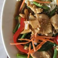 Basil Chicken With Rice · Stir-fry with oyster sauce, bamboo shoots, bell peppers, long beans, and basil.