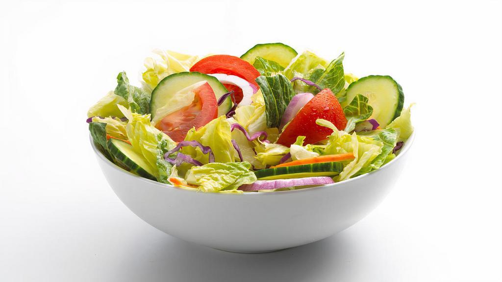 Garden Salad
 · The Salad includes Fresh Cut Lettuce, Tomatoes, Onions, Carrots & Cucumbers. Plenty of new toppings to add to your salad!