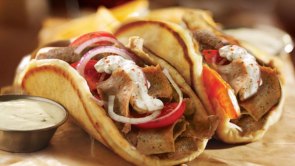 Lamb Gyro · Gyro comes with Lettuce, Tomato, Onion & White Sauce.