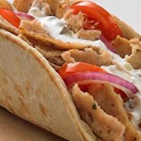 Chicken Gyro Combo · Includes Fries and FREE can soda. Gyro comes with Lettuce, Tomato, Onion & White Sauce.