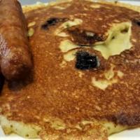 Golden Brown Pancakes · with butter and syrup.
