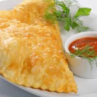 Cheburek · Deep-fried pancakes, filled with ground meat, and onions.