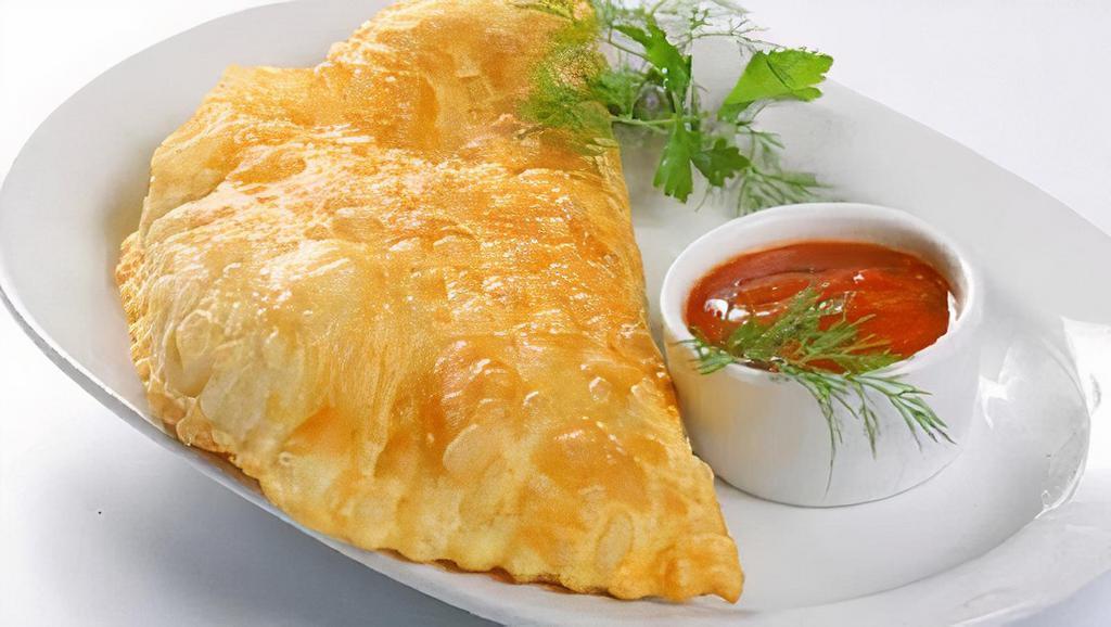 Cheburek · Deep-fried pancakes, filled with ground meat, and onions.