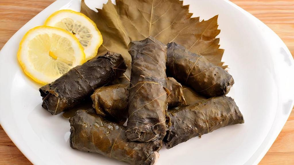 Dolma · Grape leaves and stuffed with lamb and rice.