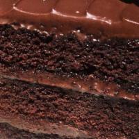 Valrhona Chocolate Cake Slice · Valrhona chocolate cake with chocolate mocha cream cheese filling and icing.