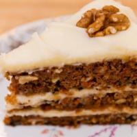 Carrot Cake Slice · Carrot cake with cream cheese filling & icing.