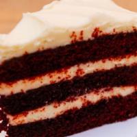 Red Velvet Cake Slice · Lush version of the classic cake with cream cheese filling & icing.