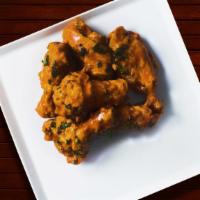 Bbq In The Air Wings · Wings cooked and tossed in classic BBQ Sauce. Served with Ranch Sauce.