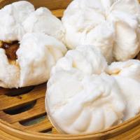 Steamed Pork Bun 蒸叉燒包 · Soft fluffy steamed white bun filled with sweet Cantonese barbecued pork