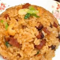 Pan Fried Sticky Rice 生炒糯米飯 · Pan sauteed rice with chinese sausage, green onions, celery, and eggs