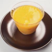 Mango Jelly Pudding 芒果布丁 · A jelly pudding made with gelatine and milk with small chopped pieces of mango spread throug...